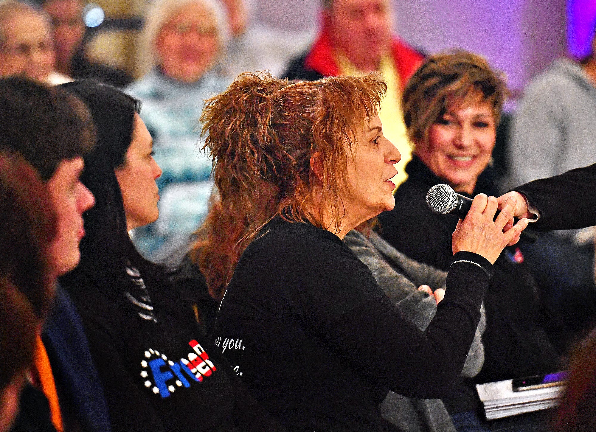 A member of Free PA asks Dr. Mehmet Oz about his religious beliefs during the audience commentary portion of the Doctor Oz for Senate event held at Wisehaven Event Center in Windsor Township, Saturday, Feb. 5, 2022. Dawn J. Sagert photo