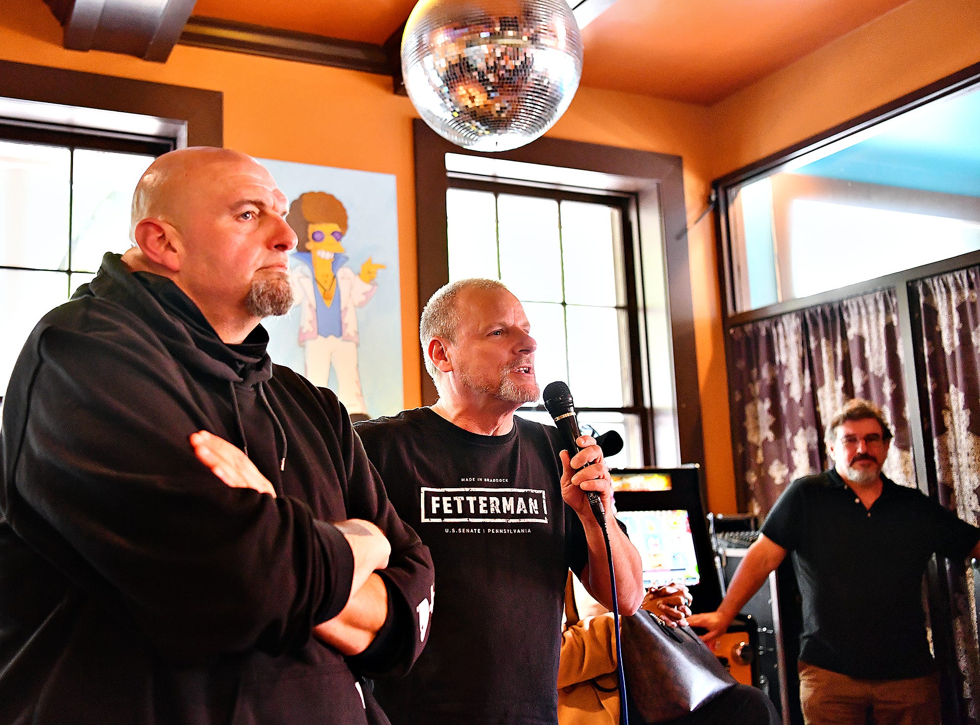 Owner Scott Eden, right, looks on as Mayor Michael Helfrich speaks during a campaign stop for U.S. Senate candidate Lt. Gov. John Fetterman at Holy Hound Taproom in York City, Thursday, May 12, 2022. Dawn J. Sagert photo