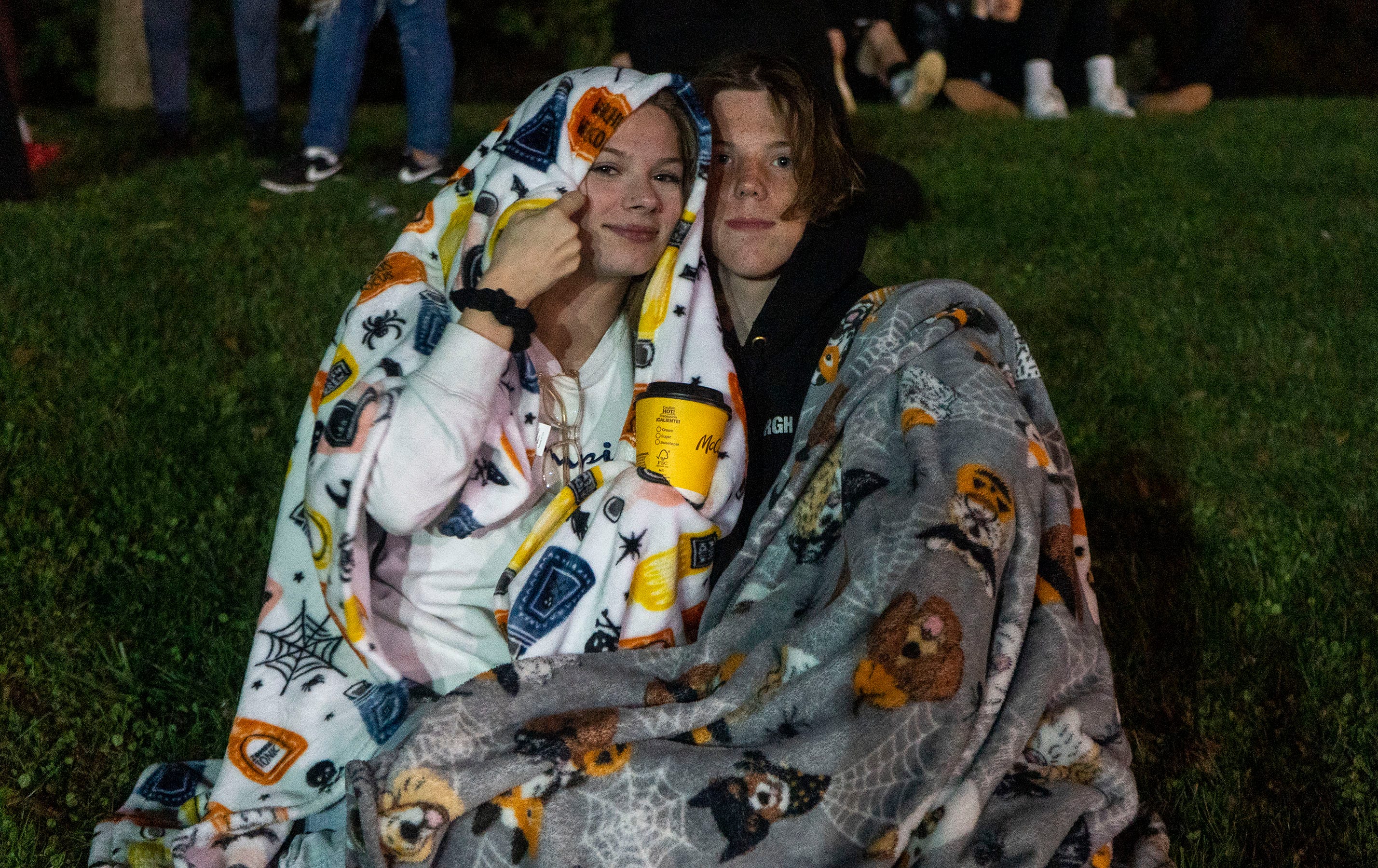 Chloe Moose and Elijah Hewitt at Northeastern's homecoming bonfire in Manchester on Thursday, Sept. 29, 2022.