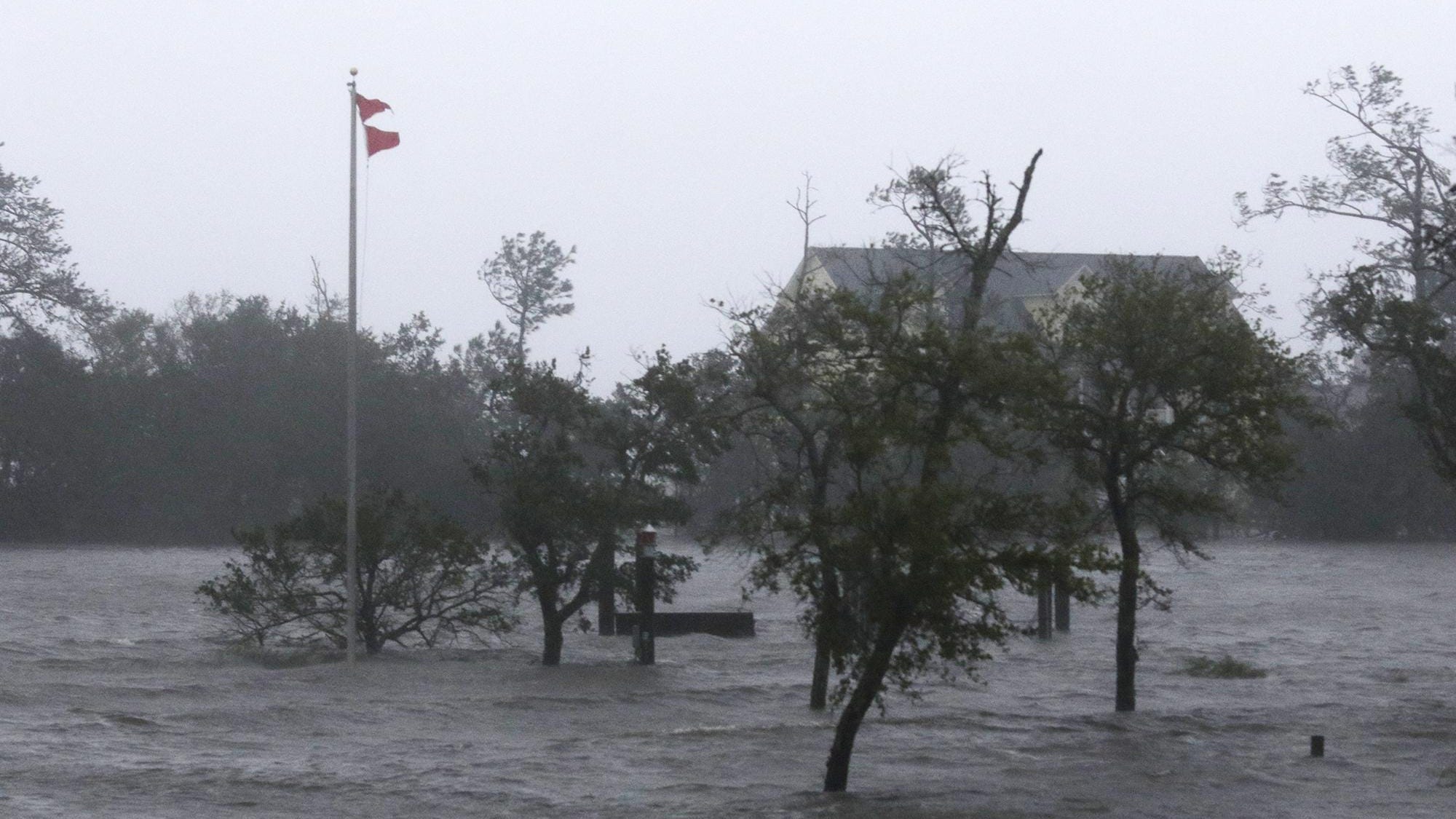 High winds and storm surge from Hurricane Florence hits Swansboro N.C.,Friday, Sept. 14, 2018. (AP Photo/Tom Copeland)