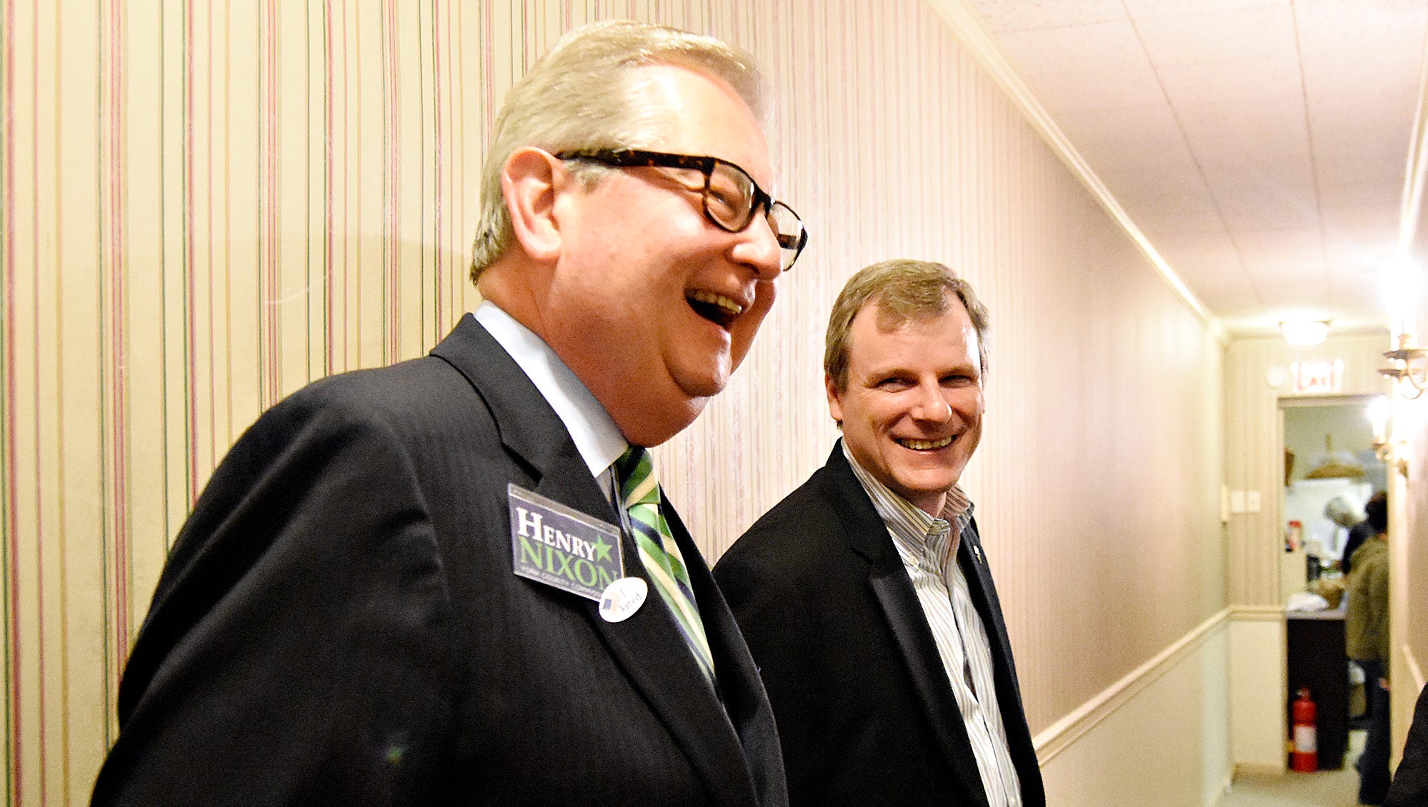City Councilmen Michael Helfrich, right, and Henry Nixon, left, share a laugh during election night at the Democratic Party Headquarters on South Duke Street in York, Pa. on Tuesday, Nov. 3, 2015. Dawn J. Sagert - dsagert@yorkdispatch.com