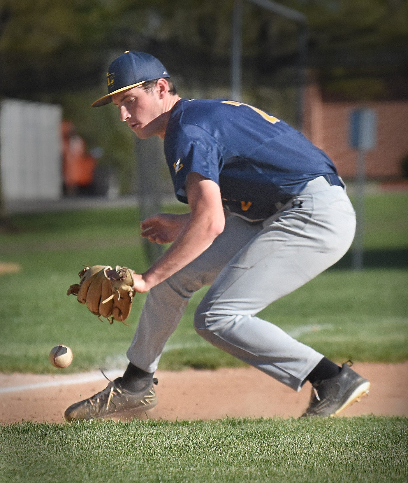 Littlestown's Brandon Clabaugh (2) fields a ground ball at third base against West York during a York-Adams Division III baseball game Wednesday, April 24, 2024, at Sunset Lane Park in West Manchester Township. West York walked off with an 11-10 win in nine innings.