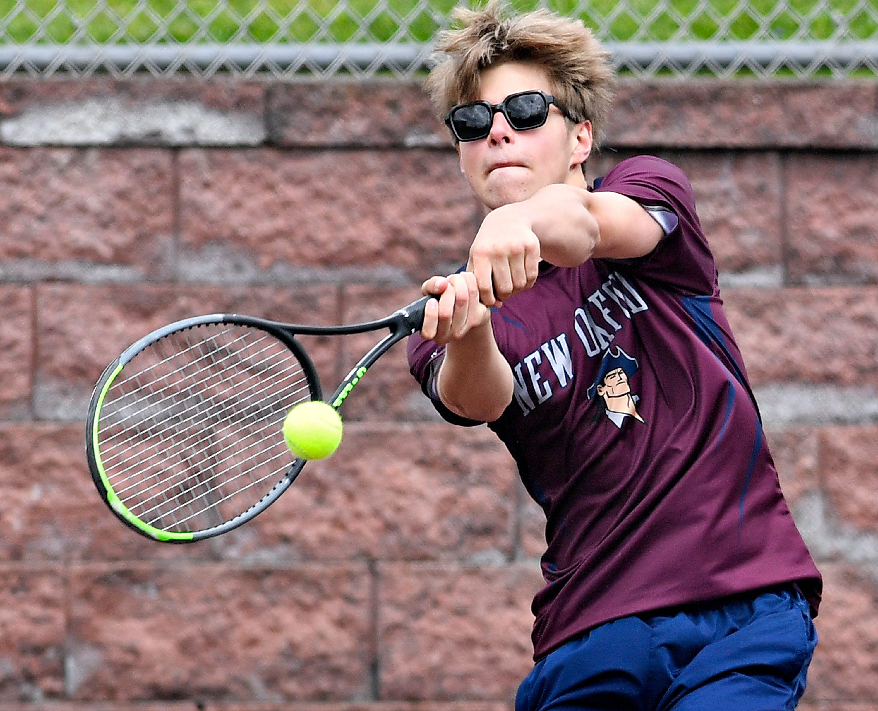 New Oxford’s Alex Millet during YAIAA boys’ 3A singles tennis tournament action at Red Lion Area Senior High School in Red Lion, Thursday, April 25, 2024. (Dawn J. Sagert/The York Dispatch)