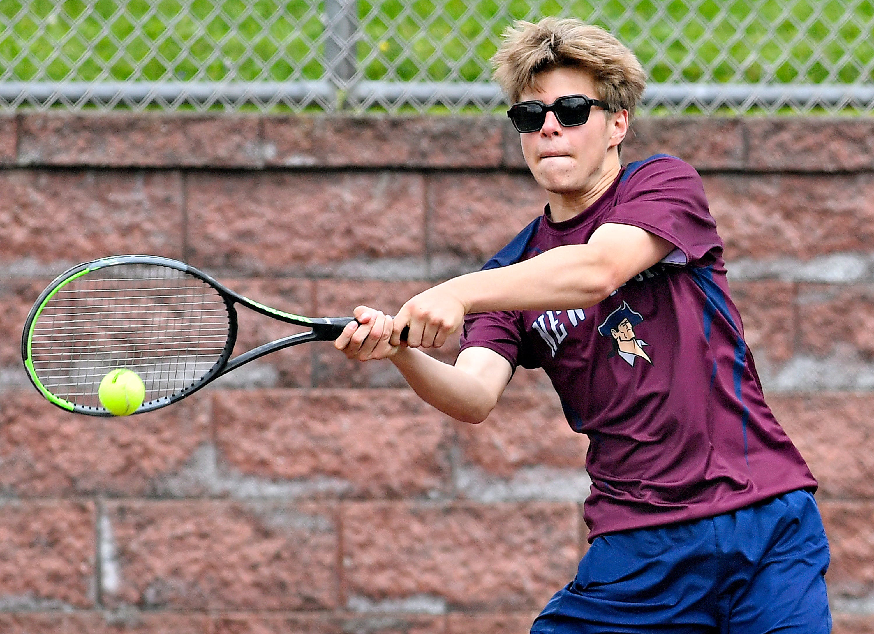 New Oxford’s Alex Millet during YAIAA boys’ 3A singles tennis tournament action at Red Lion Area Senior High School in Red Lion, Thursday, April 25, 2024. (Dawn J. Sagert/The York Dispatch)