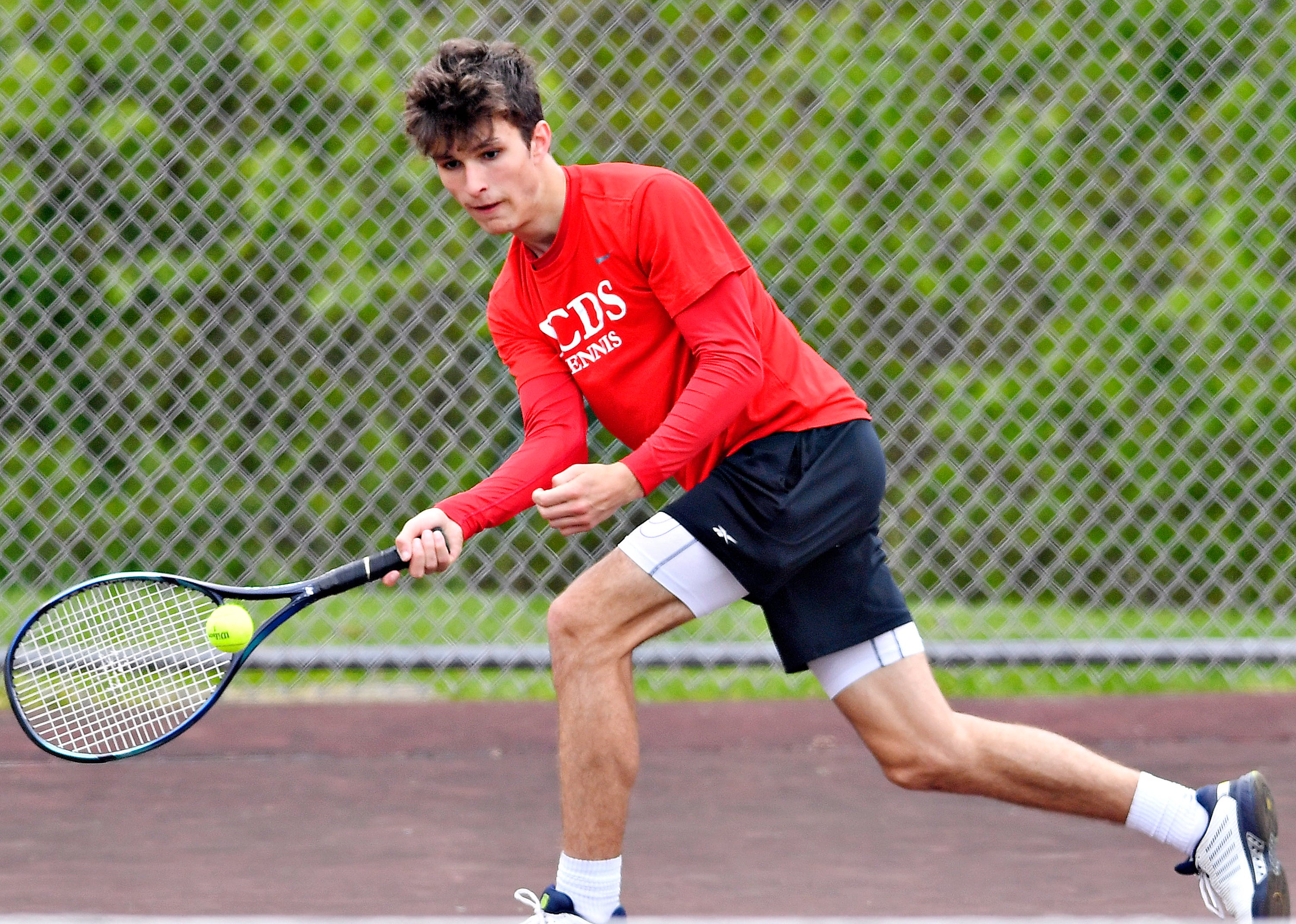 York Country Day’s McClean Abbott during YAIAA boys’ 3A singles tennis tournament action at Red Lion Area Senior High School in Red Lion, Thursday, April 25, 2024. (Dawn J. Sagert/The York Dispatch)