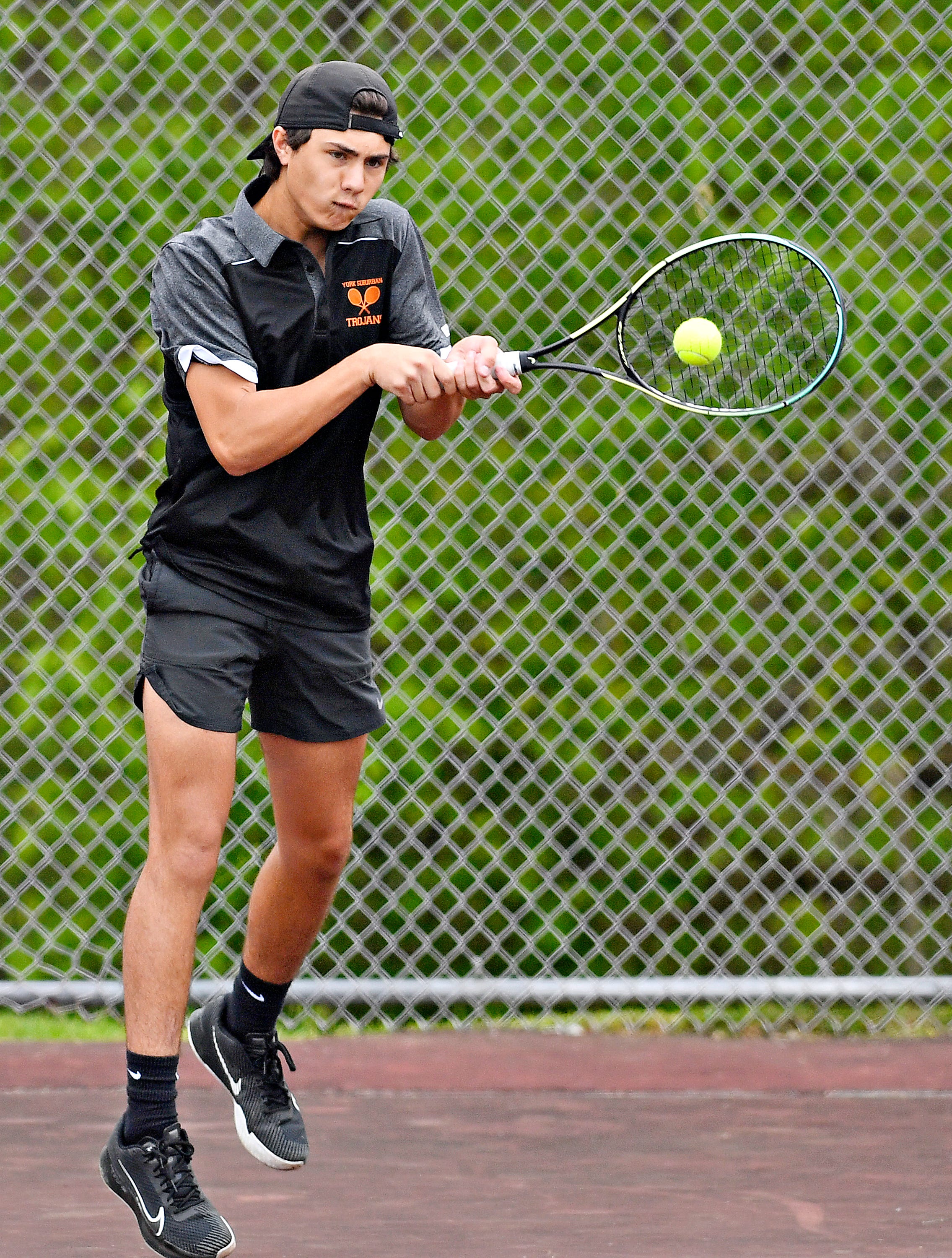 York Suburban’s Jackson Miller during YAIAA boys’ 3A singles tennis tournament action at Red Lion Area Senior High School in Red Lion, Thursday, April 25, 2024. (Dawn J. Sagert/The York Dispatch)