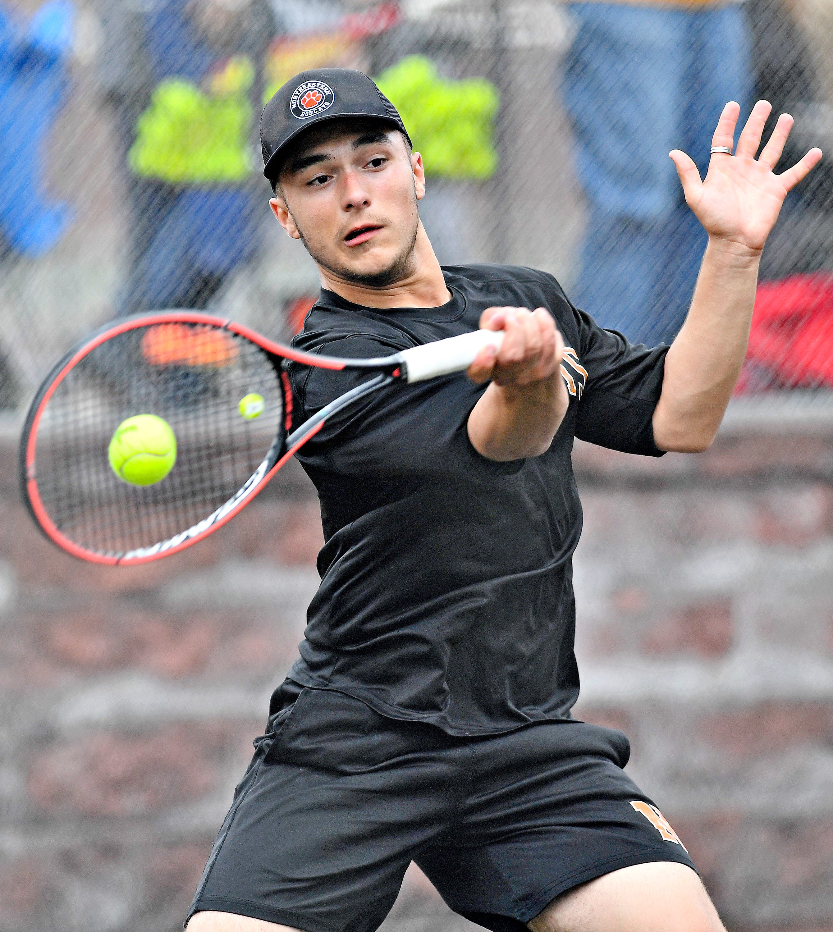 Northeastern’s Loghan Eckard during YAIAA boys’ 3A singles tennis tournament action at Red Lion Area Senior High School in Red Lion, Thursday, April 25, 2024. (Dawn J. Sagert/The York Dispatch)