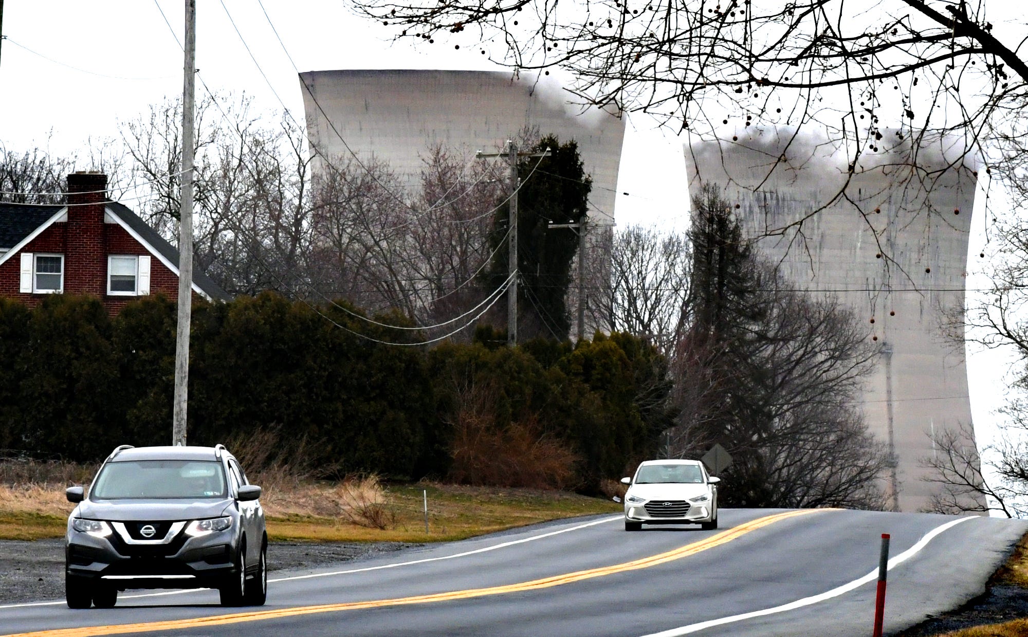 Traffic travels south on Route 441 near the Three Mile Island Nuclear Generating Station in Londonderry Township, Dauphin County, Friday, March 15, 2019. The plant's Unit 2 reactors have been shut down since the March 28,1979, partial meltdown. Bill Kalina photo