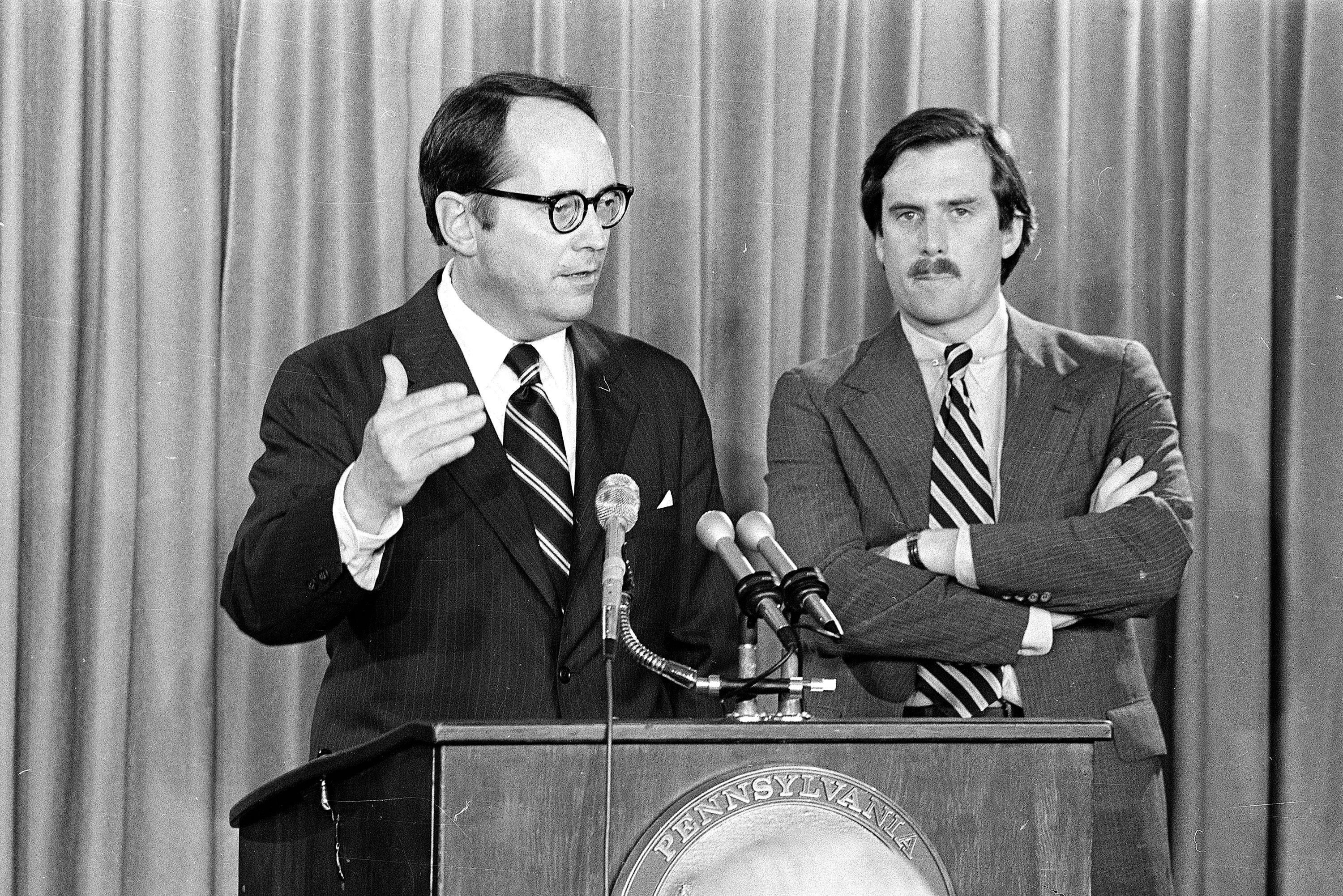 Pennsylvania Governor Dick Thornburgh, left, announces the closing of schools in the area around the Three Mile Island PWR, on March 30, 1979, in Harrisburg, Pa., after an accident at the nuclear power plant led to the release of radioactive gas from the reactor into the atmosphere. The governor advised the evacuation of small children and pregnant women. Standing at right is Lt. Gov. William Scranton. (AP Photo)