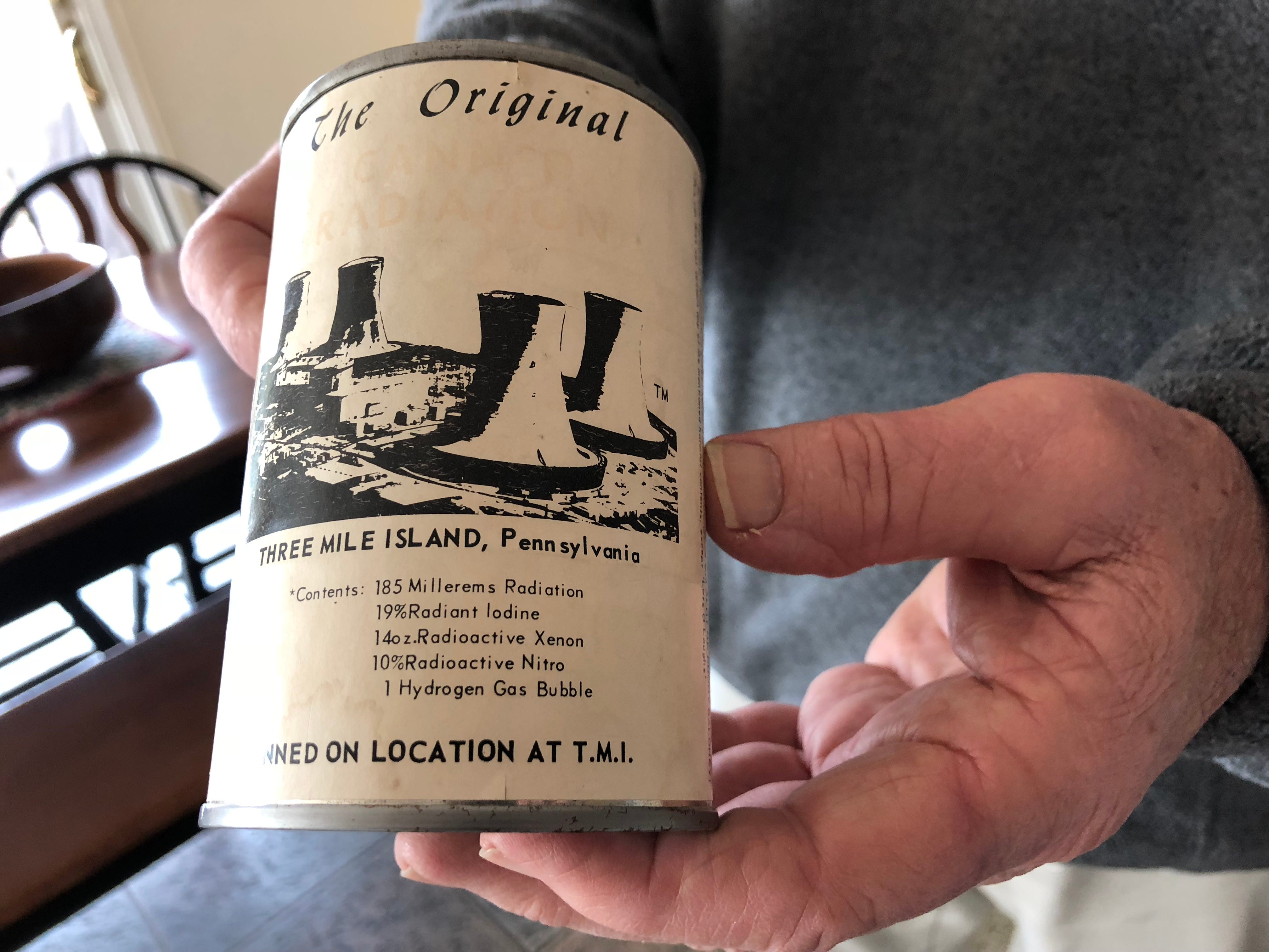 Kevin Molloy, former Dauphin County Civil Defense/Communications Director, was among the first to respond following the 1979 nuclear accident at TMI-2.

He shows an example of a gag gift created following the accident — radioactive air "canned on location at TMI." — Wednesday, March 13, 2019. (Photo by: Lindsay C. VanAsdalan)