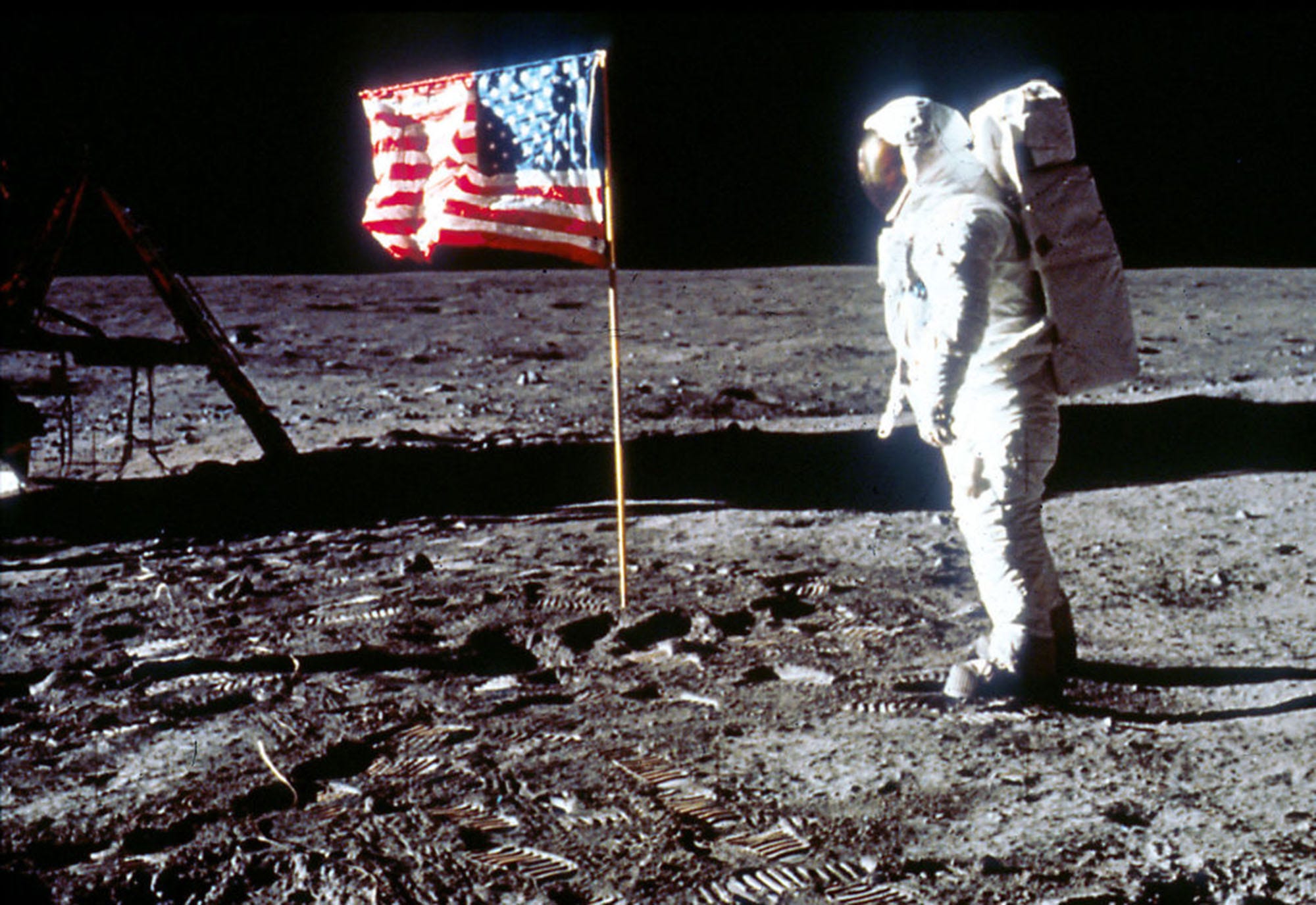 Astronaut Edwin "Buzz" Aldrin poses next to the U.S. flag July 20, 1969 on the moon during the Apollo 11 mission.