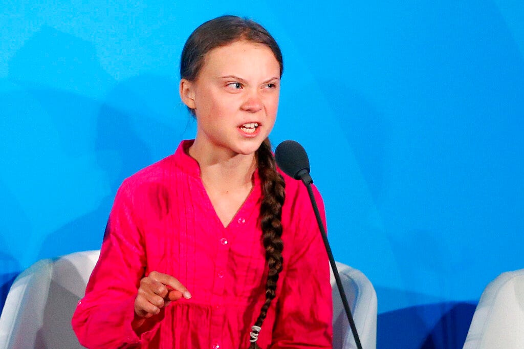 Environmental activist Greta Thunberg, of Sweden, addresses the Climate Action Summit on Monday, Sept. 23, at the United Nations General Assembly at U.N. headquarters. She gives mostly emotionless talks, but on Monday, she shed the stick-to-the-science message and frequently choked up when she scolded world leaders at the United Nations, repeating the phrase "how dare you" over and over in a highly praised address. (AP Photo/Jason DeCrow)