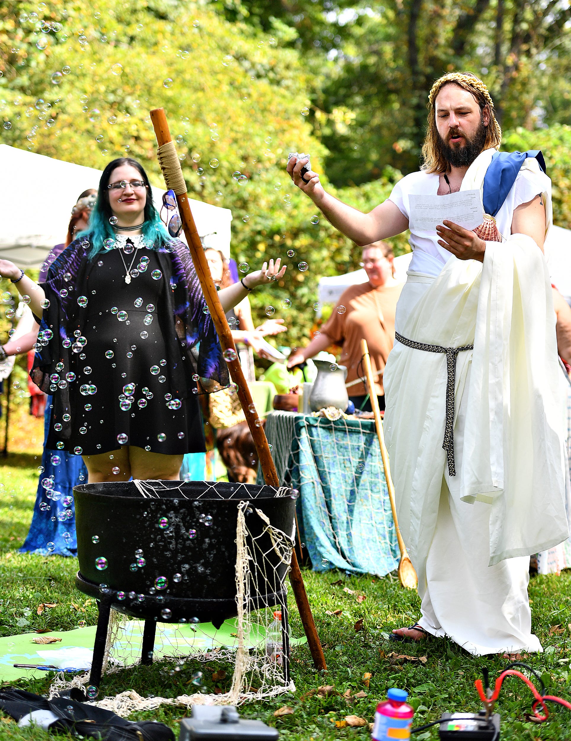 A harvest ritual is performed as the main ritual of the day, to honor both the harvest time of year and to cultivate community, during the 8th annual Pagan Pride Festival at Samuel S. Lewis State Park in Lower Windsor Township, Saturday, Sept. 28, 2019. Dawn J. Sagert photo