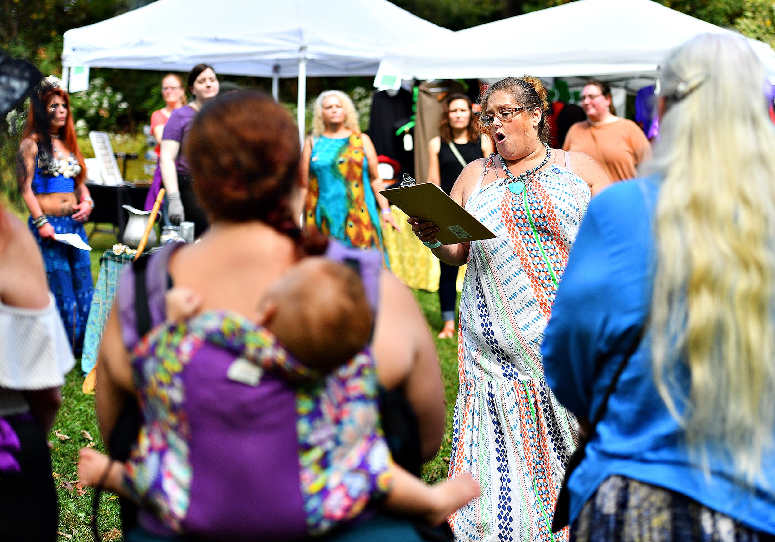 A harvest ritual is performed as the main ritual of the day, to honor both the harvest time of year and to cultivate community, during the 8th annual Pagan Pride Festival at Samuel S. Lewis State Park in Lower Windsor Township, Saturday, Sept. 28, 2019. Dawn J. Sagert photo