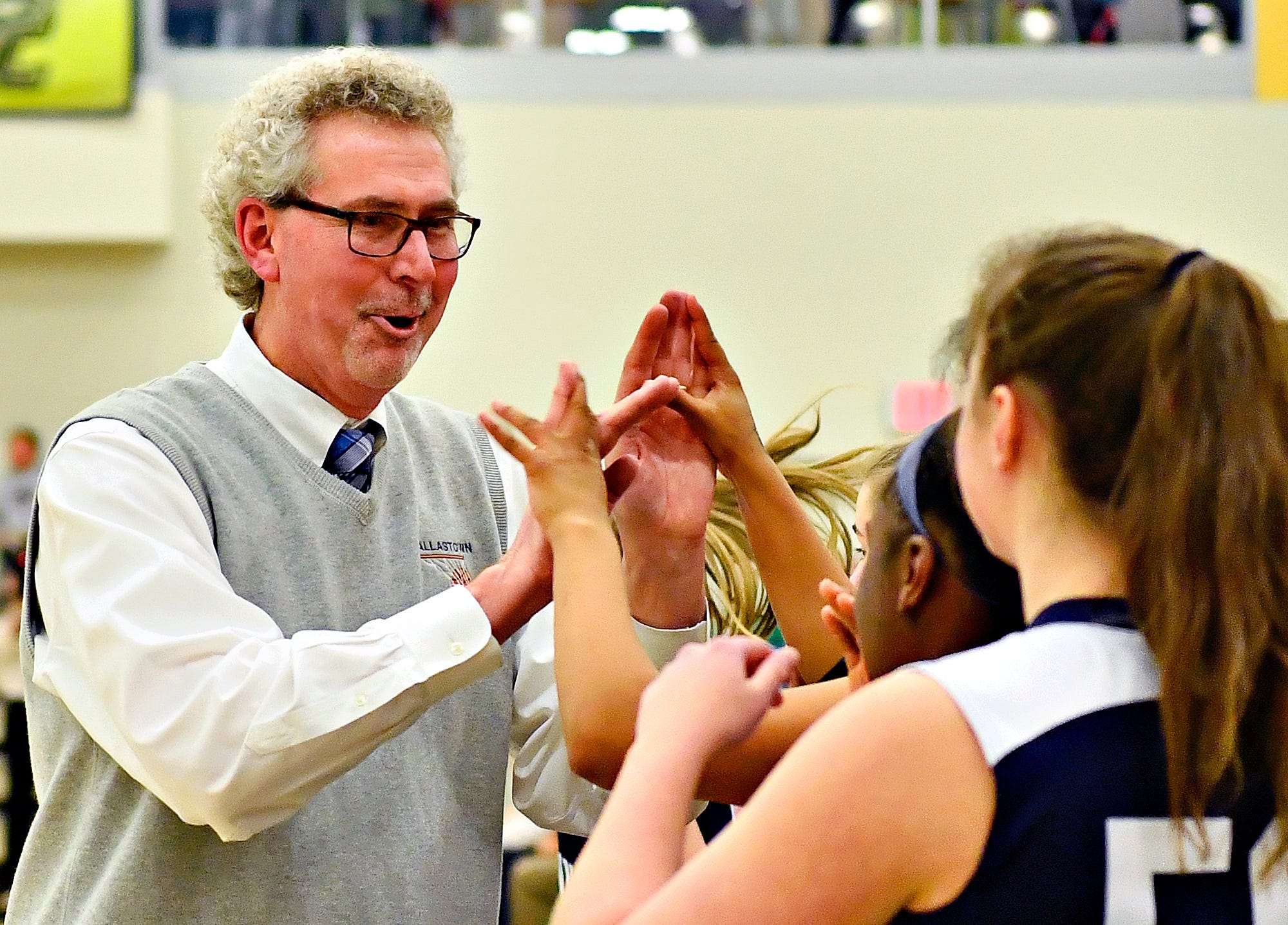 Dallastown's Head Coach Jay Rexroth hands out high-fives on the sideline with seconds on the clock during YAIAA girls' basketball championship action against Gettysburg at Grumbacher Sport and Fitness Center at York College of Pennsylvania in Spring Garden Township, Friday, Feb. 14, 2020. Dallastown would win the game 42-38. Dawn J. Sagert photo