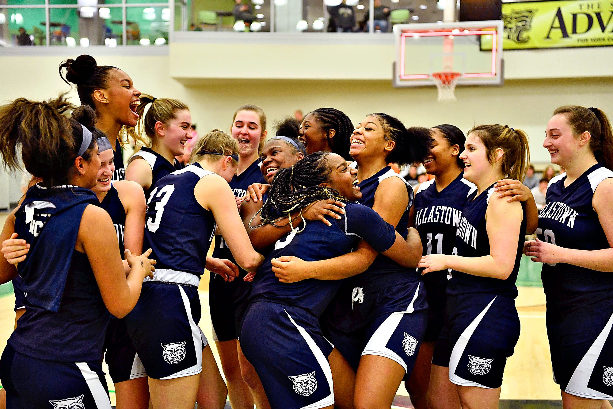 Dallastown celebrates a 42-38 win over Gettysburg during YAIAA girls' basketball championship action at Grumbacher Sport and Fitness Center at York College of Pennsylvania in Spring Garden Township, Friday, Feb. 14, 2020. Dawn J. Sagert photo