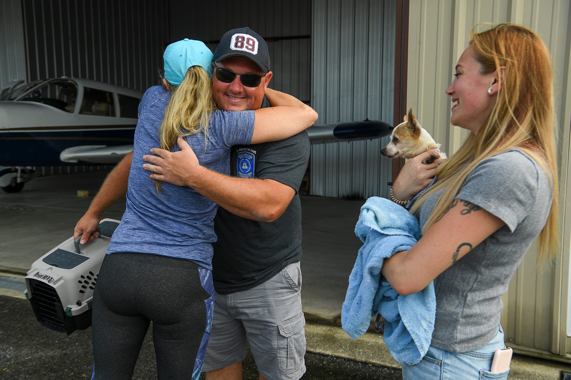 Ame Kessler hugs volunteer pilot Matt Russ, a York Area United firefighter, after he flew four and a half hours round trip to bring Lucy home to her family, Thursday, September 10, 2020.
John A. Pavoncello photo