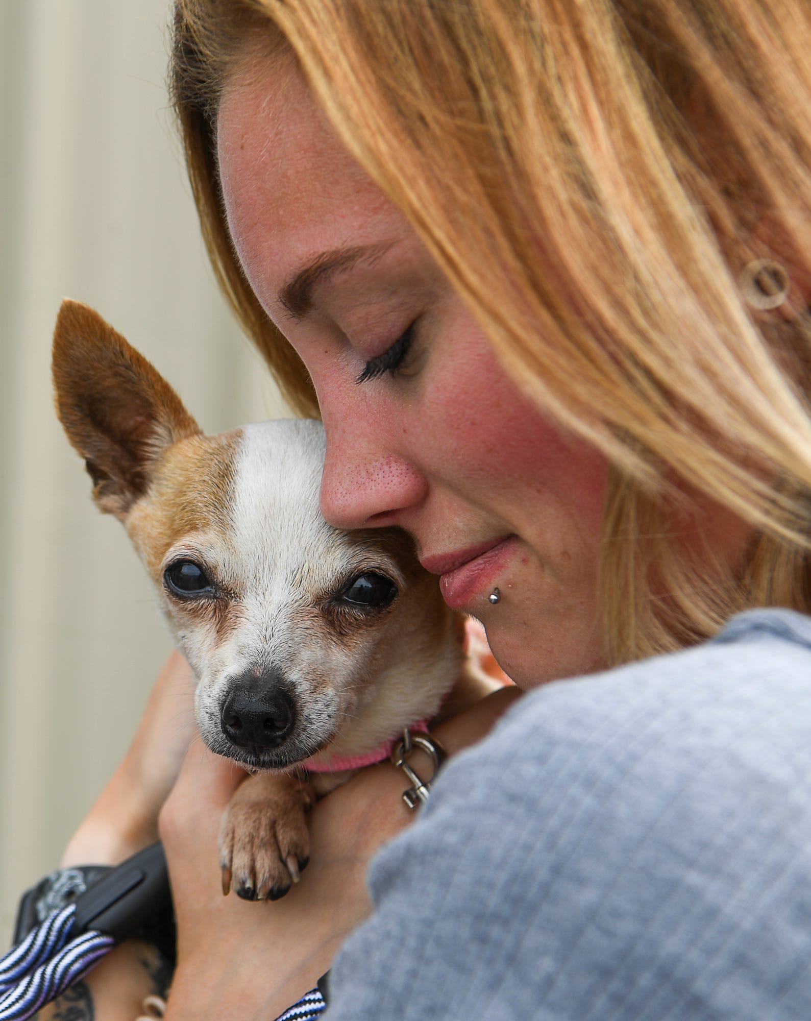Alexis Regula is reunited with her dog Lucy who she lost nine years ago while living in Tennessee, Thursday, September 10, 2020.
John A. Pavoncello photo