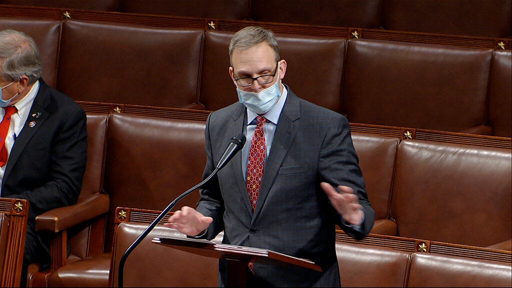 In this image from video, Rep. Scott Perry, R-Pa., speaks as the House debates the objection to confirm the Electoral College vote from Pennsylvania, at the U.S. Capitol early Thursday, Jan. 7, 2021. (House Television via AP)