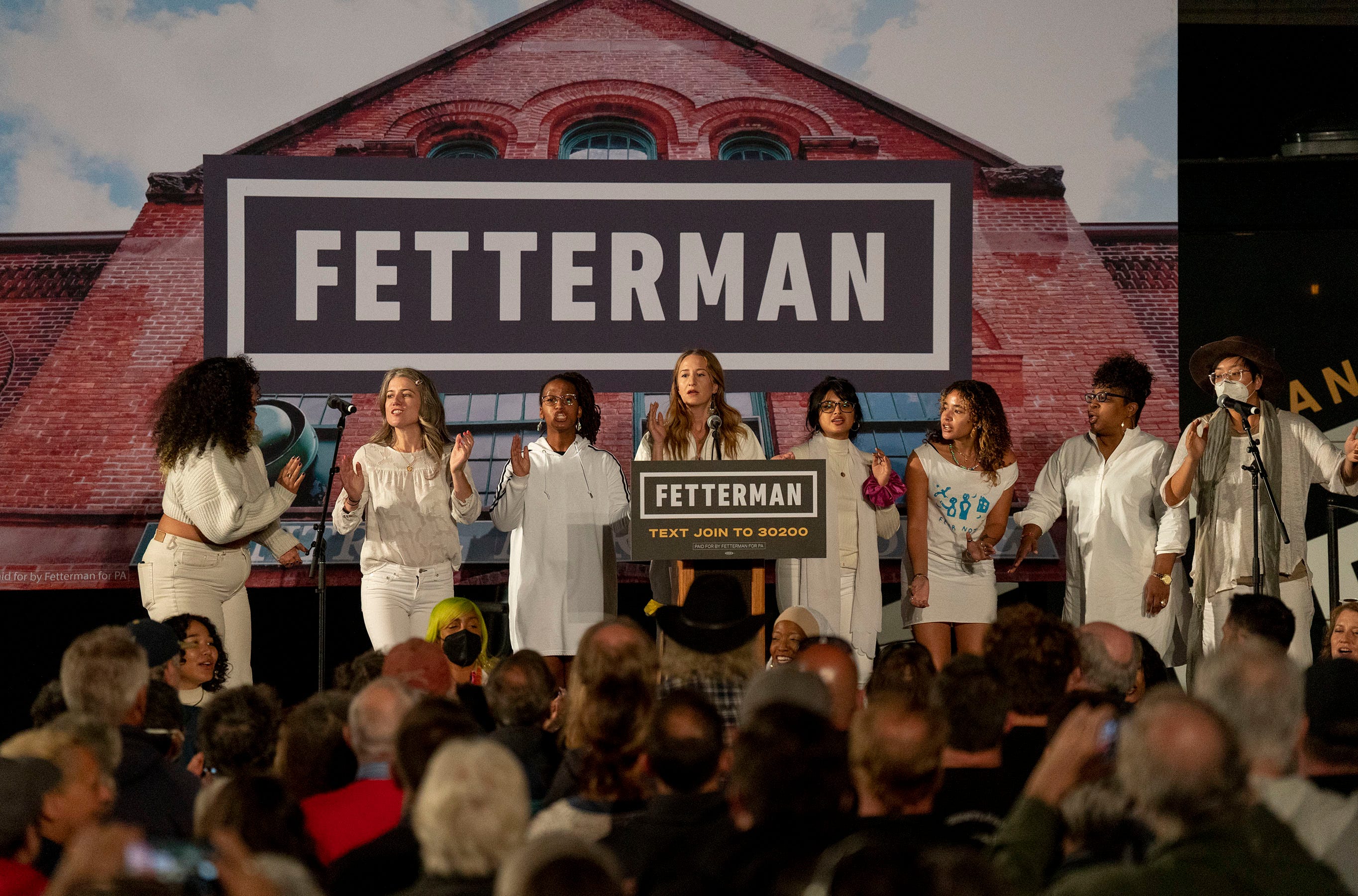 The Resistance Revival Chorus, from New York City, performing before John Fetterman and guests spoke at the rally in York on Saturday, Oct. 8, 2022.