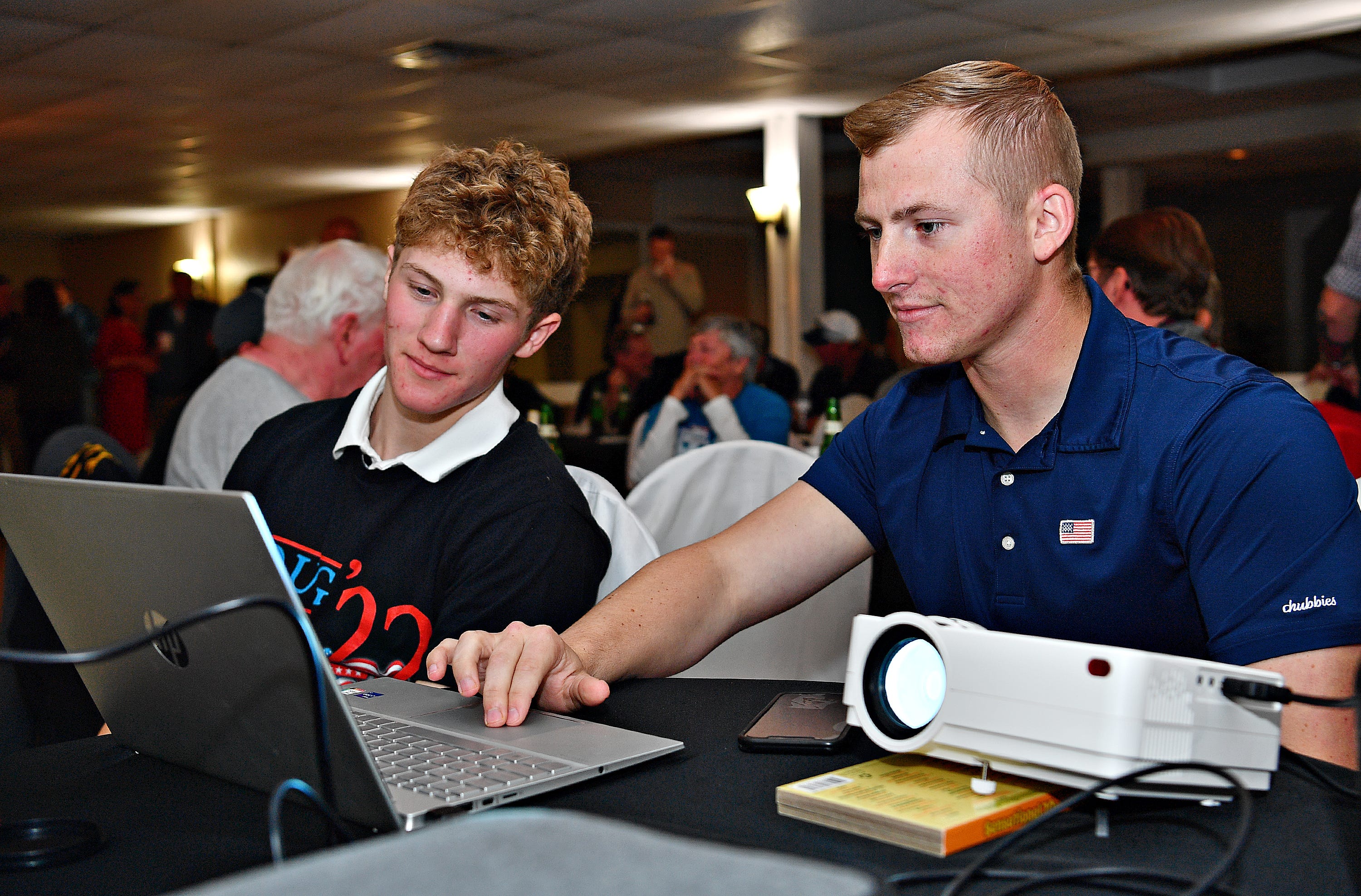 Kyle Deisley, left, of Windsor Township, and Nicholas Shields, of York Township, watch for election results during the York County Republicans watch party at Wisehaven Event Center in Windsor Township, Tuesday, Nov. 8, 2022. Dawn J. Sagert/The York Dispatch