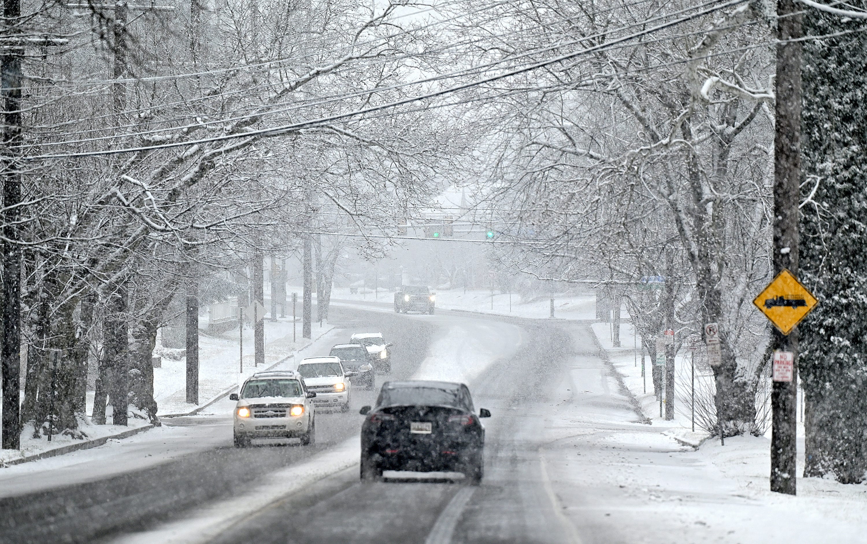 Snow falls on Country Club Road in Spring Garden Township, Wednesday, Jan. 25, 2023. Dawn J. Sagert photo