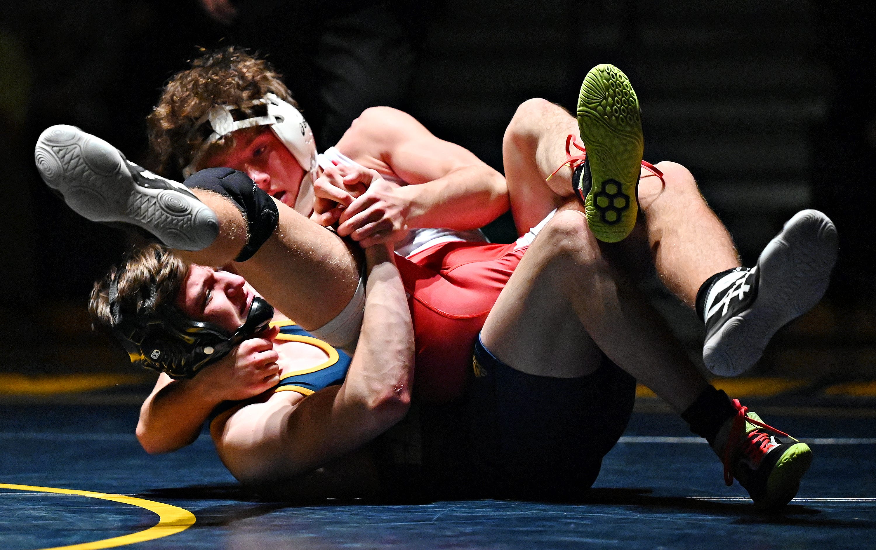 Eastern York’s Camron Weidlich, back, and Hamburg’s Daniel Brady compete in the 133-pound weight class during PIAA District 3, Class 2-A first round wrestling action at Eastern York High School in Lower Windsor Township, Monday, Jan. 30, 2023. Brady would win the match and Eastern York would win the meet 50-22. Dawn J. Sagert photo