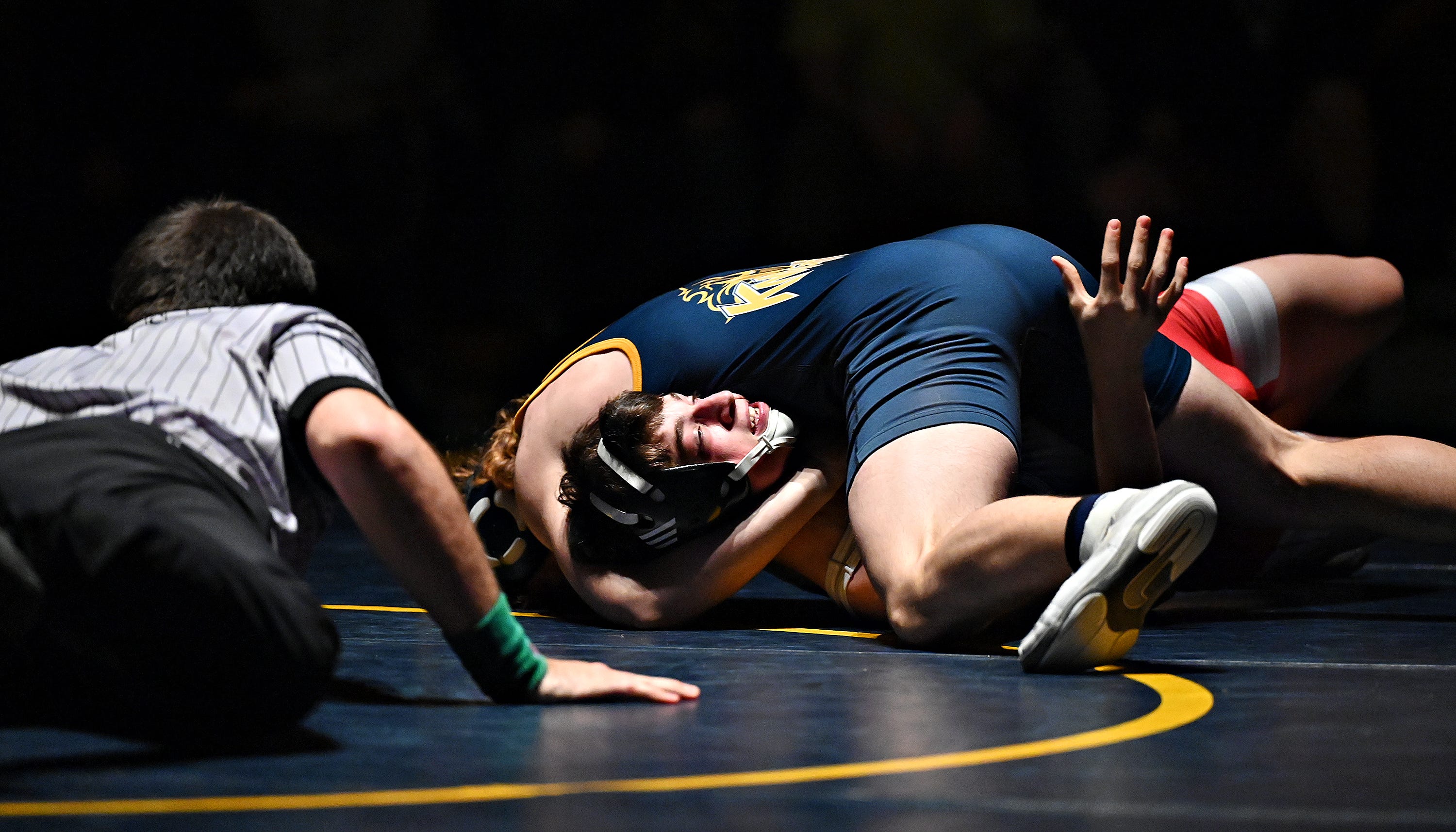 Eastern York’s Sam Myers, top, and Hamburg’s Holden Gesicki compete in the 160-pound weight class during PIAA District 3, Class 2-A first round wrestling action at Eastern York High School in Lower Windsor Township, Monday, Jan. 30, 2023. Myers would win the match and Eastern York would win the meet 50-22. Dawn J. Sagert photo