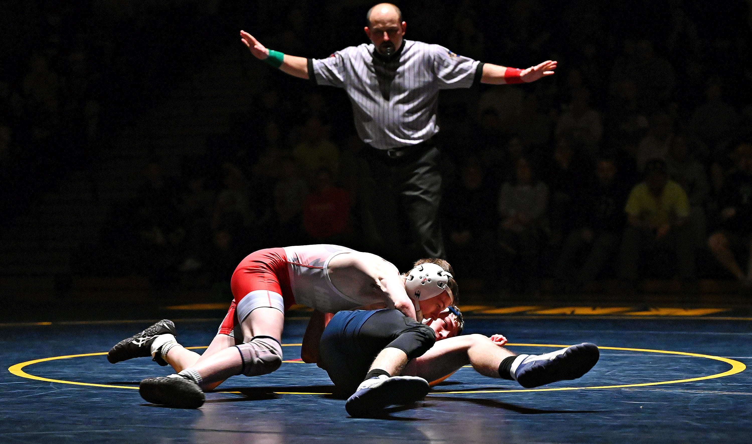 Eastern York’s Blake Summerson, right, and Hamburg’s Chase Homan compete in the 121-pound weight class during PIAA District 3, Class 2-A first round wrestling action at Eastern York High School in Lower Windsor Township, Monday, Jan. 30, 2023. Homan would win the match and Eastern York would win the meet 50-22. Dawn J. Sagert photo