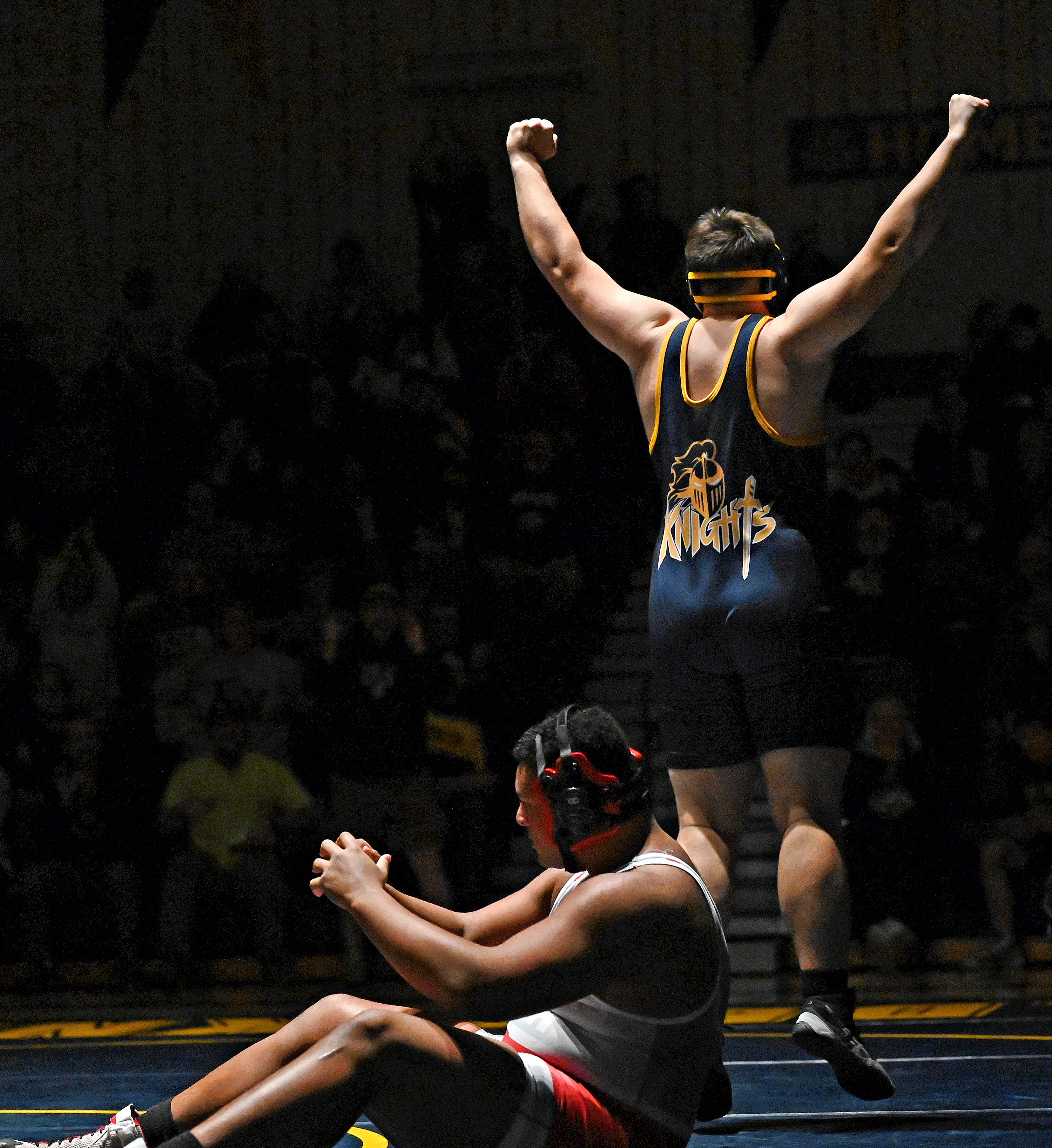 Eastern York’s Bryce Myers, back, celebrates a win over Hamburg’s Charles Sheppard while competing in the 285-pound weight class during PIAA District 3, Class 2-A first round wrestling action at Eastern York High School in Lower Windsor Township, Monday, Jan. 30, 2023. Myers would win with a pin at 0:35 and Eastern York would win the meet 50-22. Dawn J. Sagert photo
