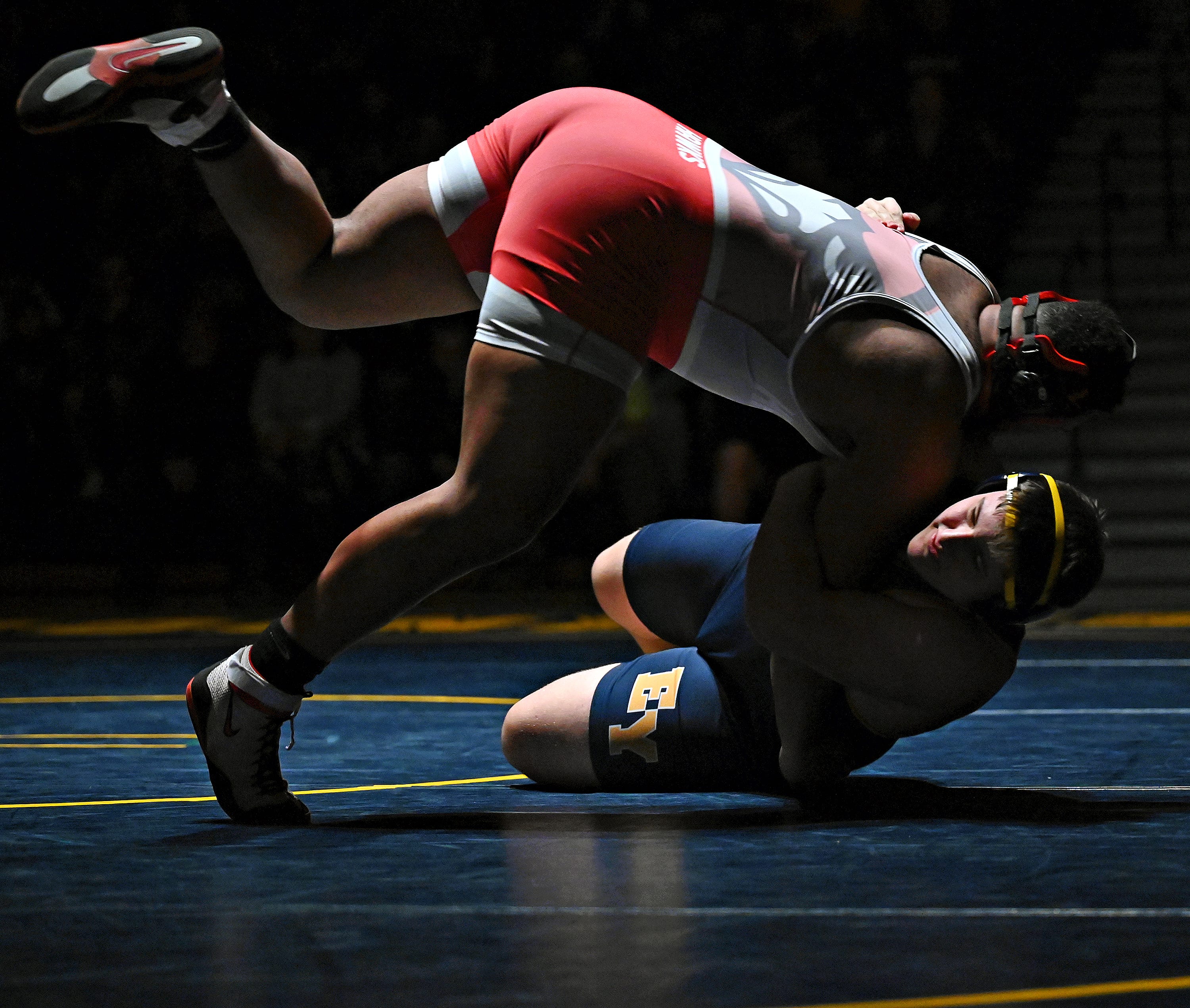 Eastern York’s Bryce Myers, bottom, and Hamburg’s Charles Sheppard compete in the 285-pound weight class during PIAA District 3, Class 2-A first round wrestling action at Eastern York High School in Lower Windsor Township, Monday, Jan. 30, 2023. Myers would win with a pin at 0:35 and Eastern York would win the meet 50-22. Dawn J. Sagert photo