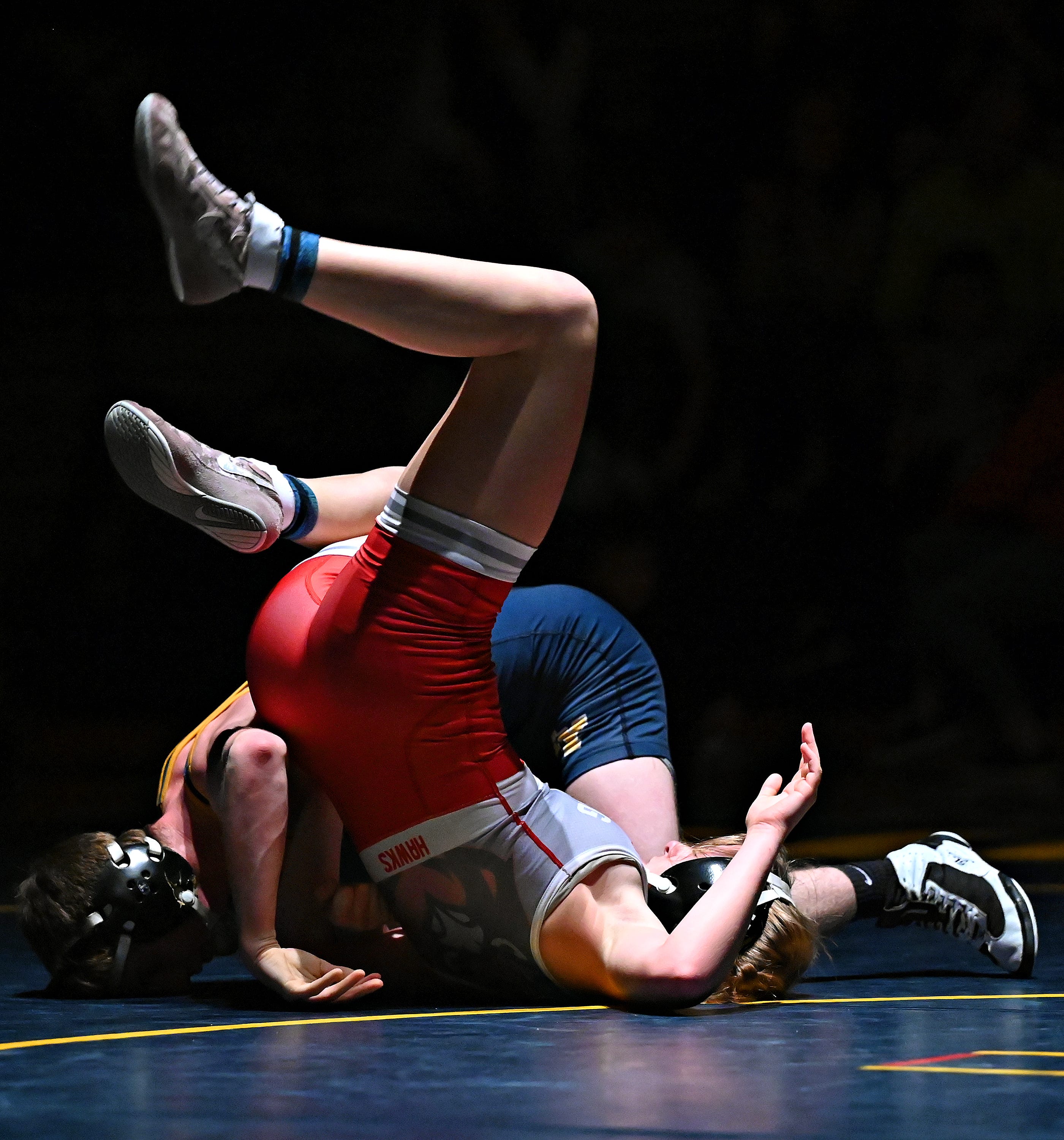 Eastern York’s George Leischner, back, and Hamburg’s Riley Petrie compete in the 127-pound weight class during PIAA District 3, Class 2-A first round wrestling action at Eastern York High School in Lower Windsor Township, Monday, Jan. 30, 2023. Leischner would win with a pin at 1:29 and Eastern York would win the meet 50-22. Dawn J. Sagert photo