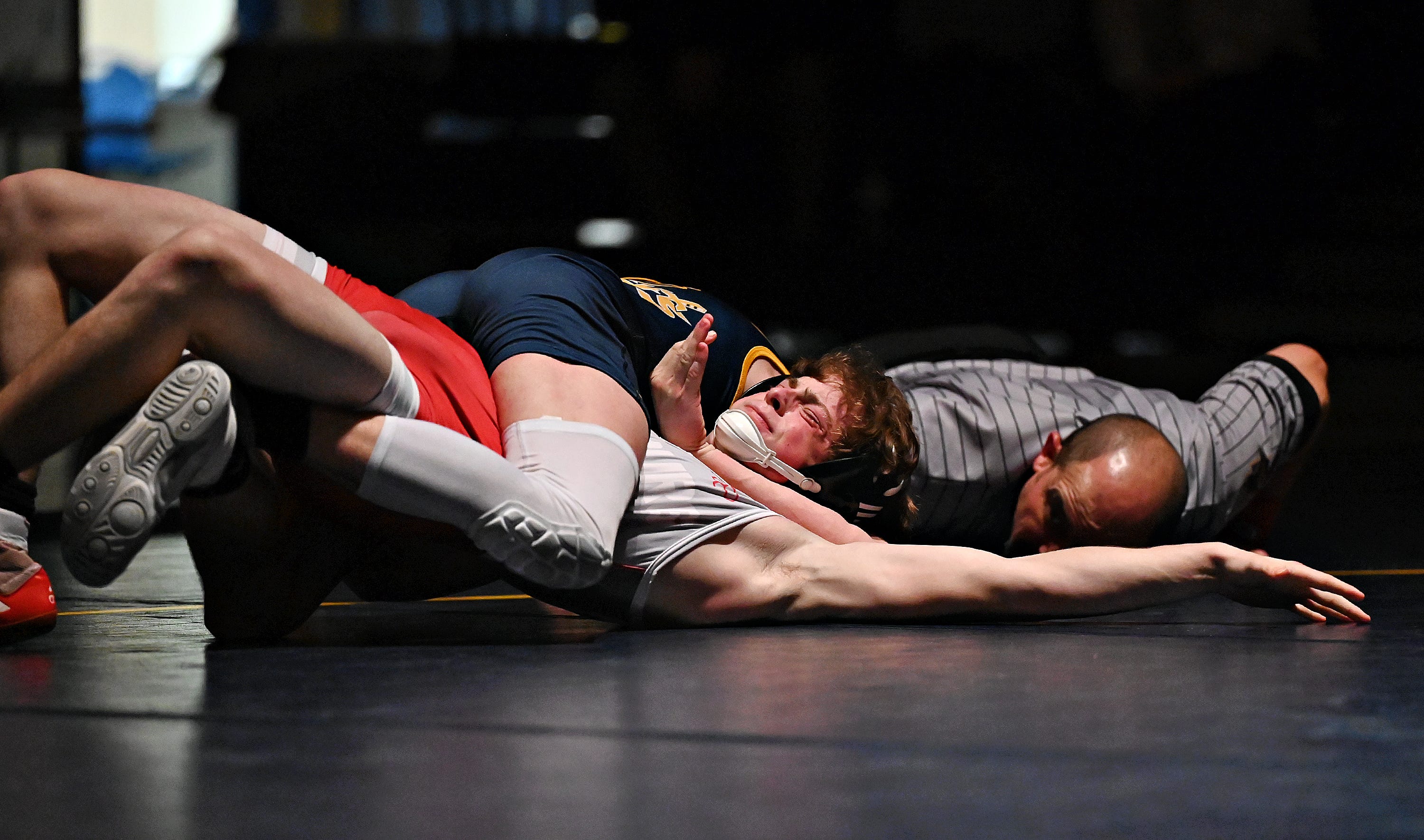 Eastern York’s Keagan Hubler, back, and Hamburg’s Logan Monroe compete in the 152-pound weight class during PIAA District 3, Class 2-A first round wrestling action at Eastern York High School in Lower Windsor Township, Monday, Jan. 30, 2023. Hubler would win the match with a pin at 1:24 and Eastern York would win the meet 50-22. Dawn J. Sagert photo